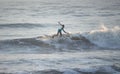 Kovalam, Chennai, Tamilnadu, India - Ã¢â¬Å½Ã¢â¬Å½August 9th Ã¢â¬Å½2021: Young boy Indian surfer surfing and practicing on the beach waves